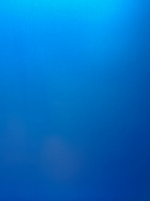 Only blue until we peel the protective layer away! Then it becomes an ever-changing piece of art!
